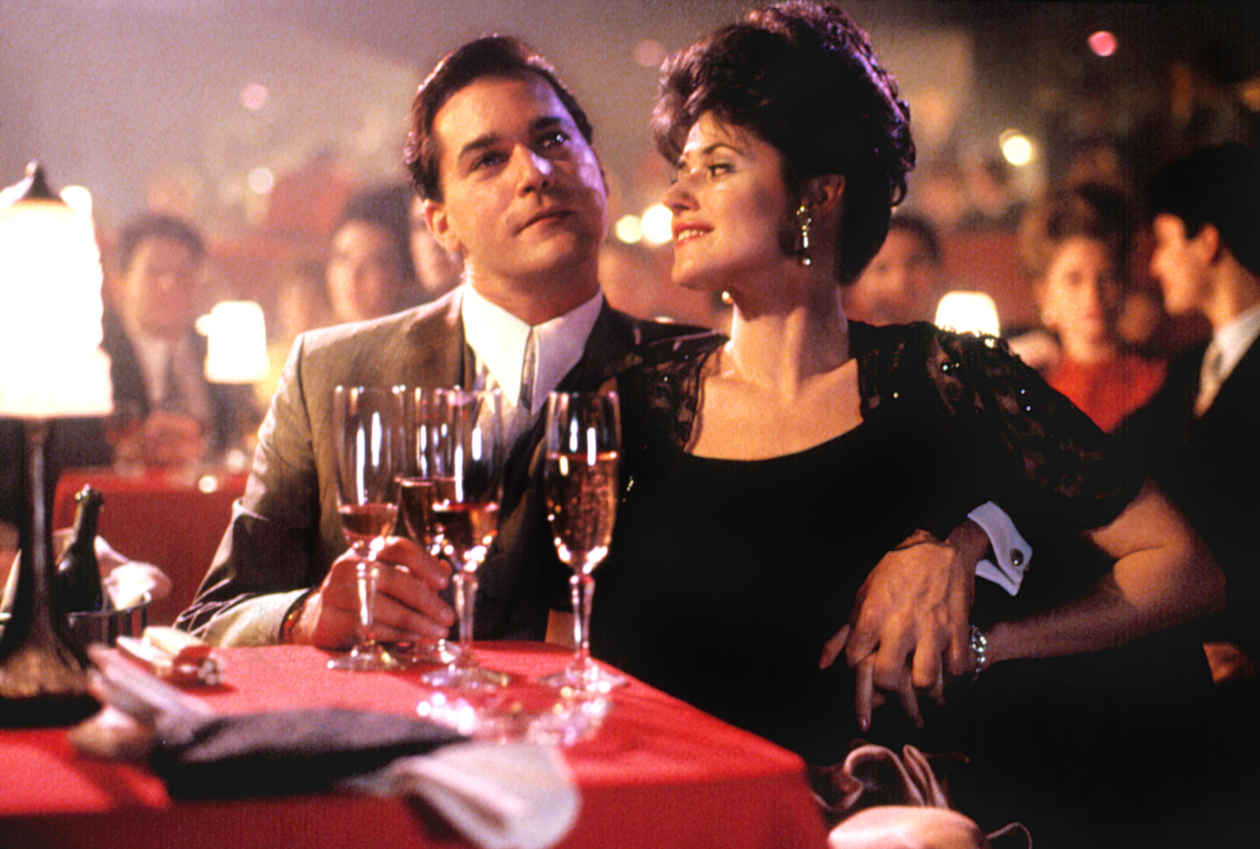 Ray Liotta and Lorraine Bracco enjoy drinks during a scene in "Goodfellas"