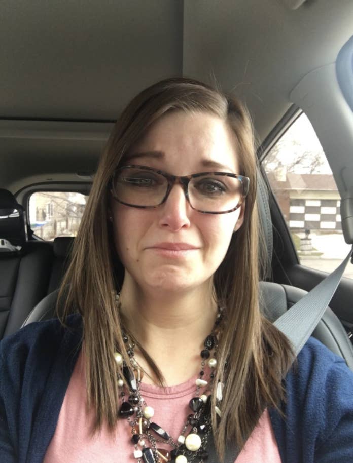 Rachael sitting in her car in tears