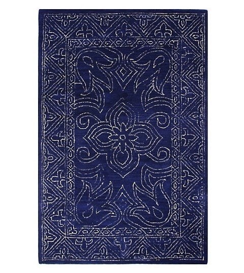 Dark blue wool rug with white print
