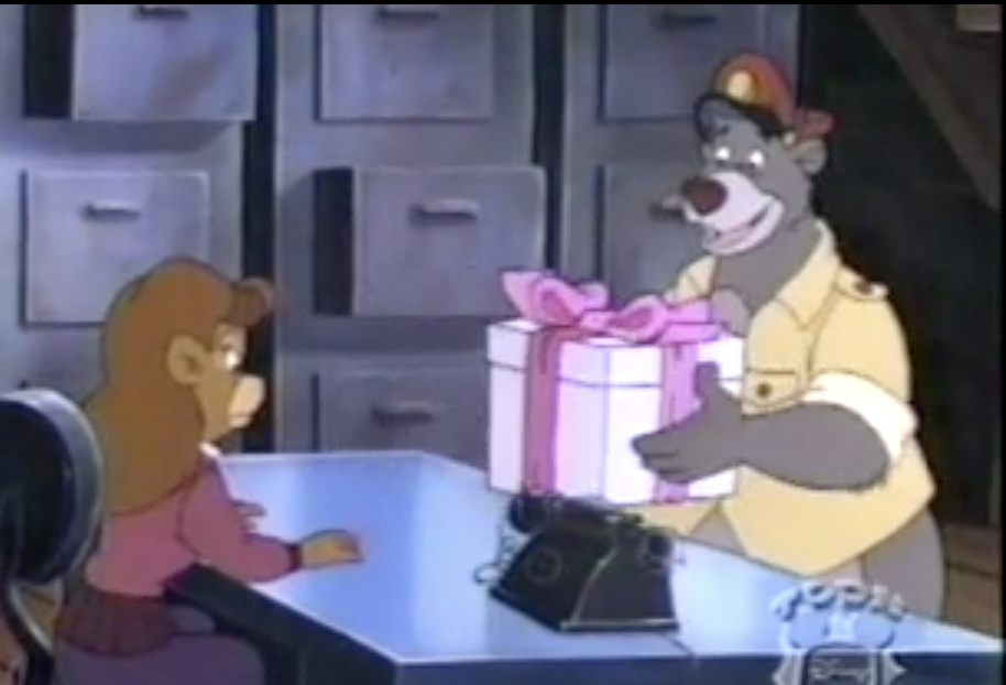 Baloo picks up a present