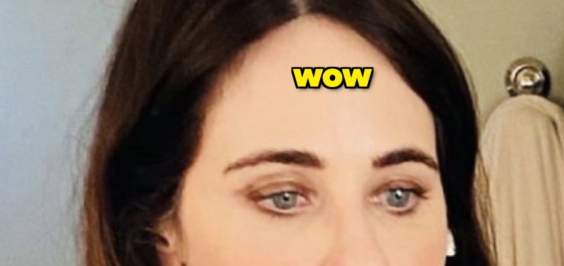 Zooey Deschanel selfie of her forehead with the caption "wow" written over it