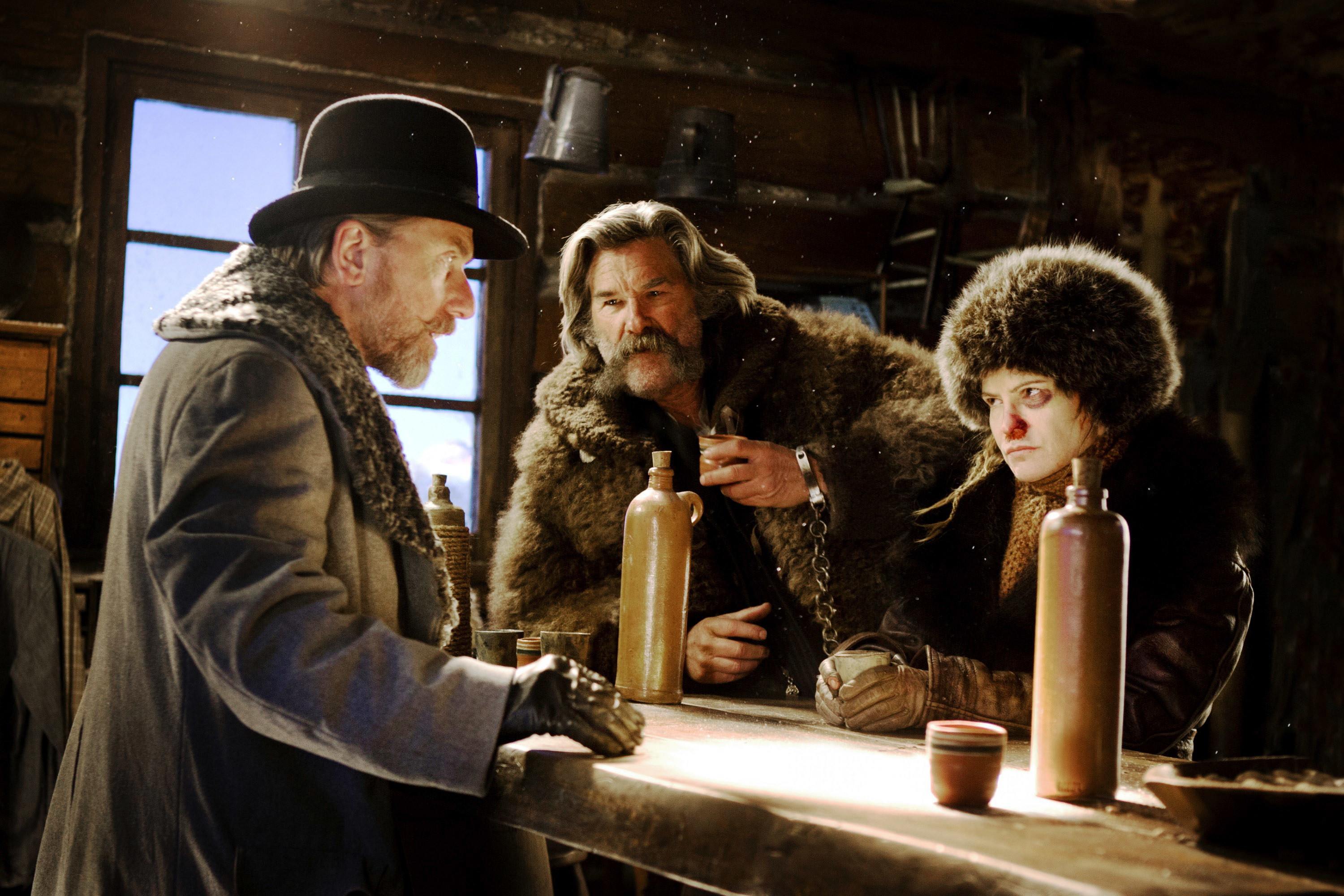 Tim Roth, Kurt Russell, and Jennifer Jason Leigh in "The Hateful Eight"