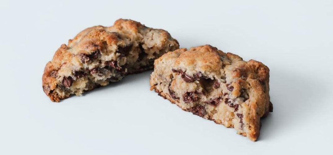The cookie broken in half so the inside is visible