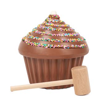 hard chocolate giant cupcake with sprinkles and a mallet