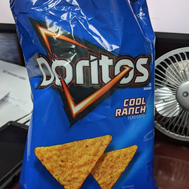 A blue bag of Doritos that says "Cool Ranch"