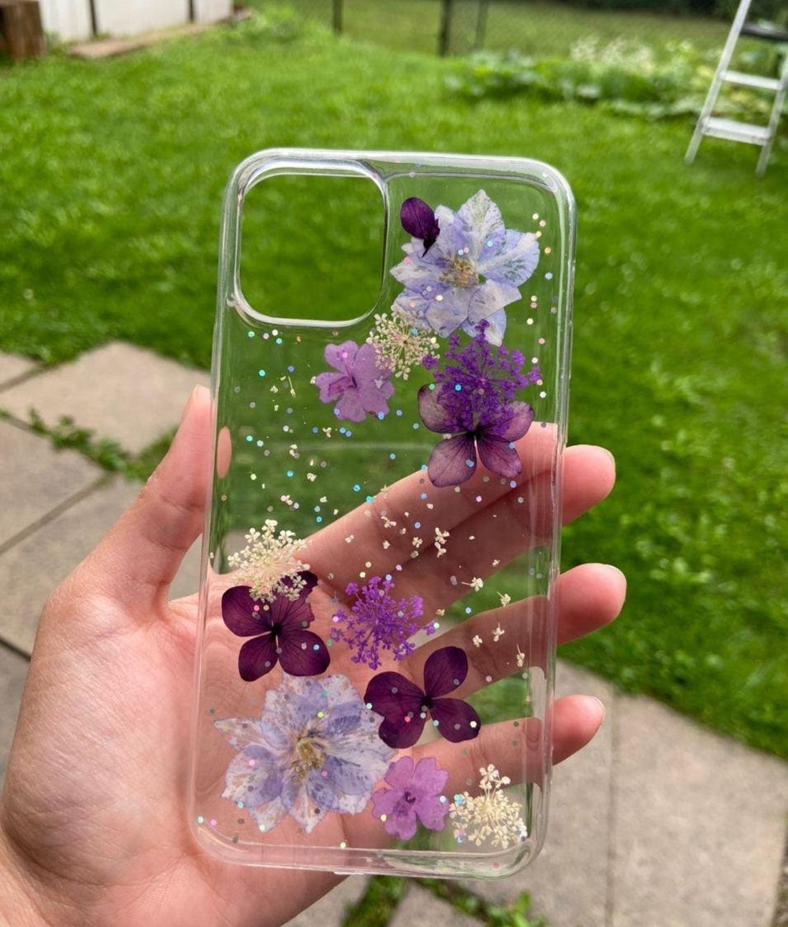 A person holding the phone case