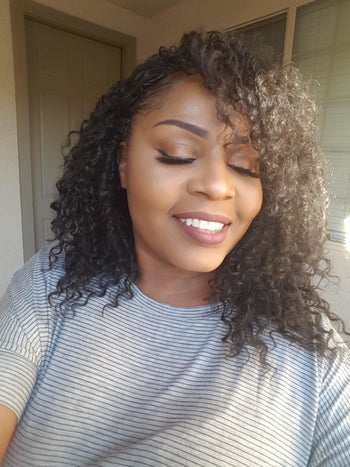 Reviewer with darker skin showing off their beautiful, even complexion