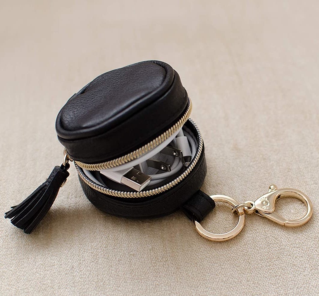 An Apple charging cord inside the pouch