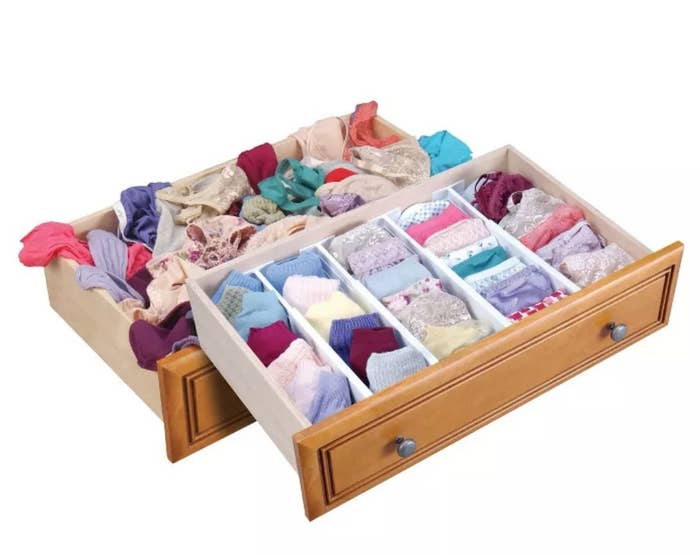 A drawer organizer filled with underwear