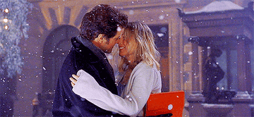 Mark and Bridget kiss in snow