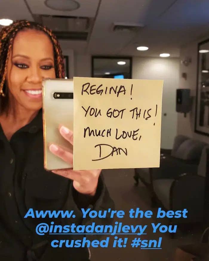 Regina King taking a picture of the note that Dan Levy left for her at Saturday Night Live