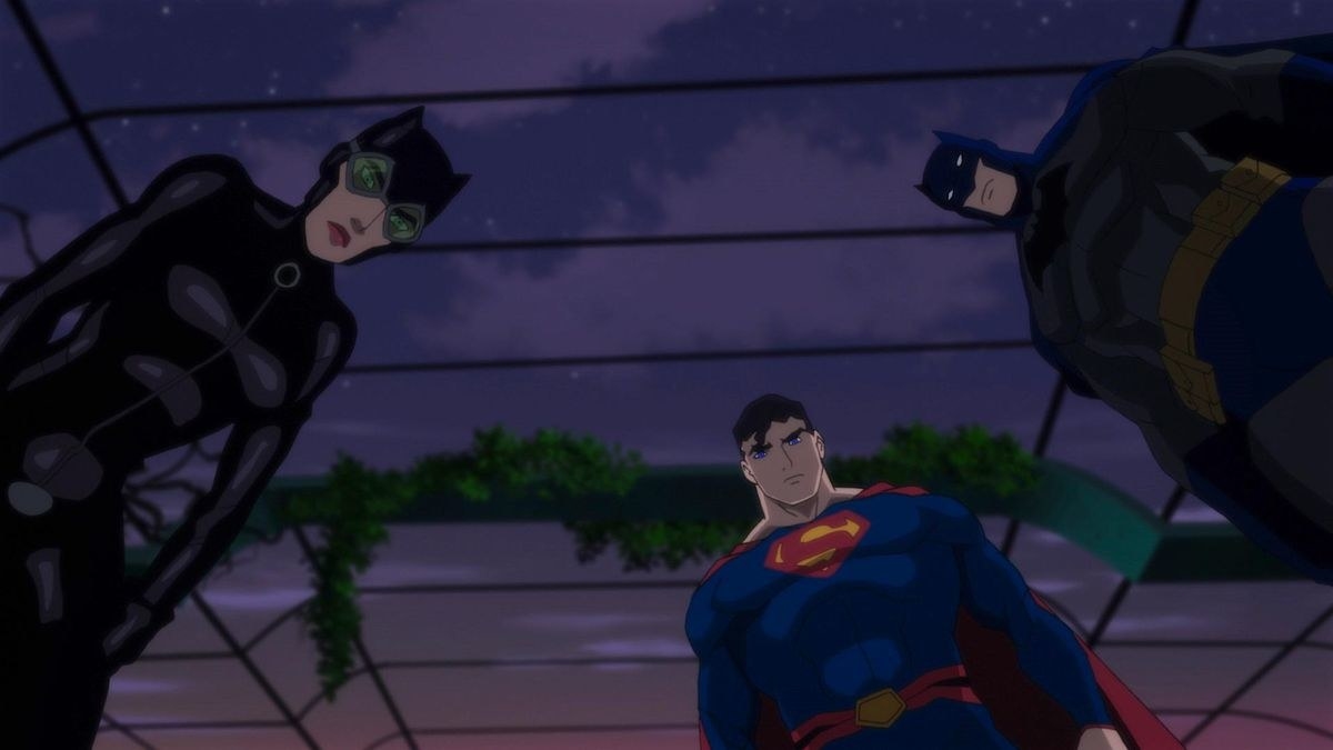 Catwoman, Superman, and Batman joining forces to fight crime