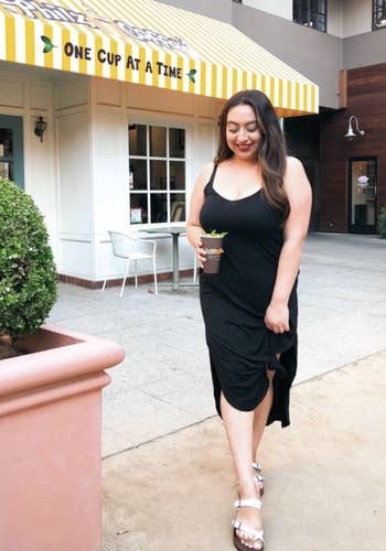 reviewer wearing the black dress