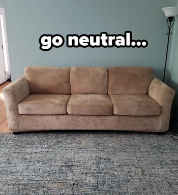 reviewer's camel stretch velvet couch cover on a large couch with text overlaid that reads