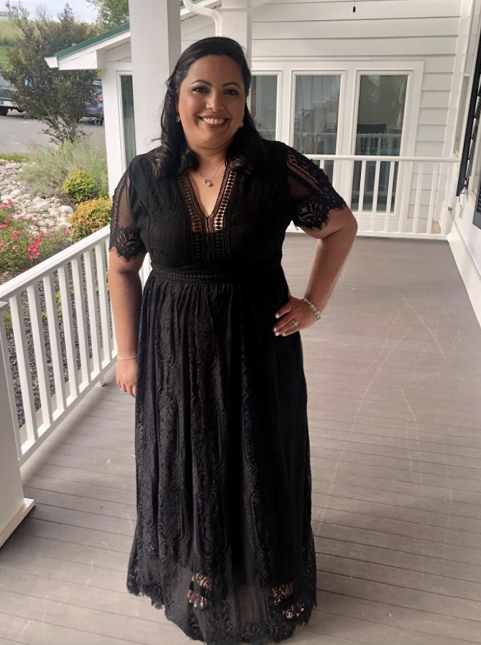 reviewer wearing the black dress 