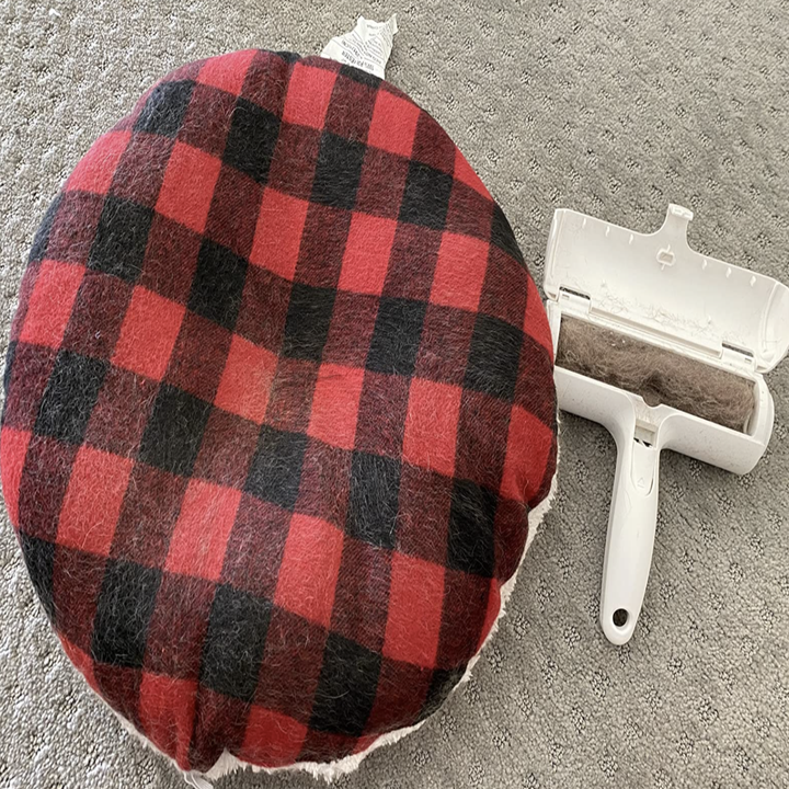 The same pillowcase now completely clean and all of the fur is in the roller