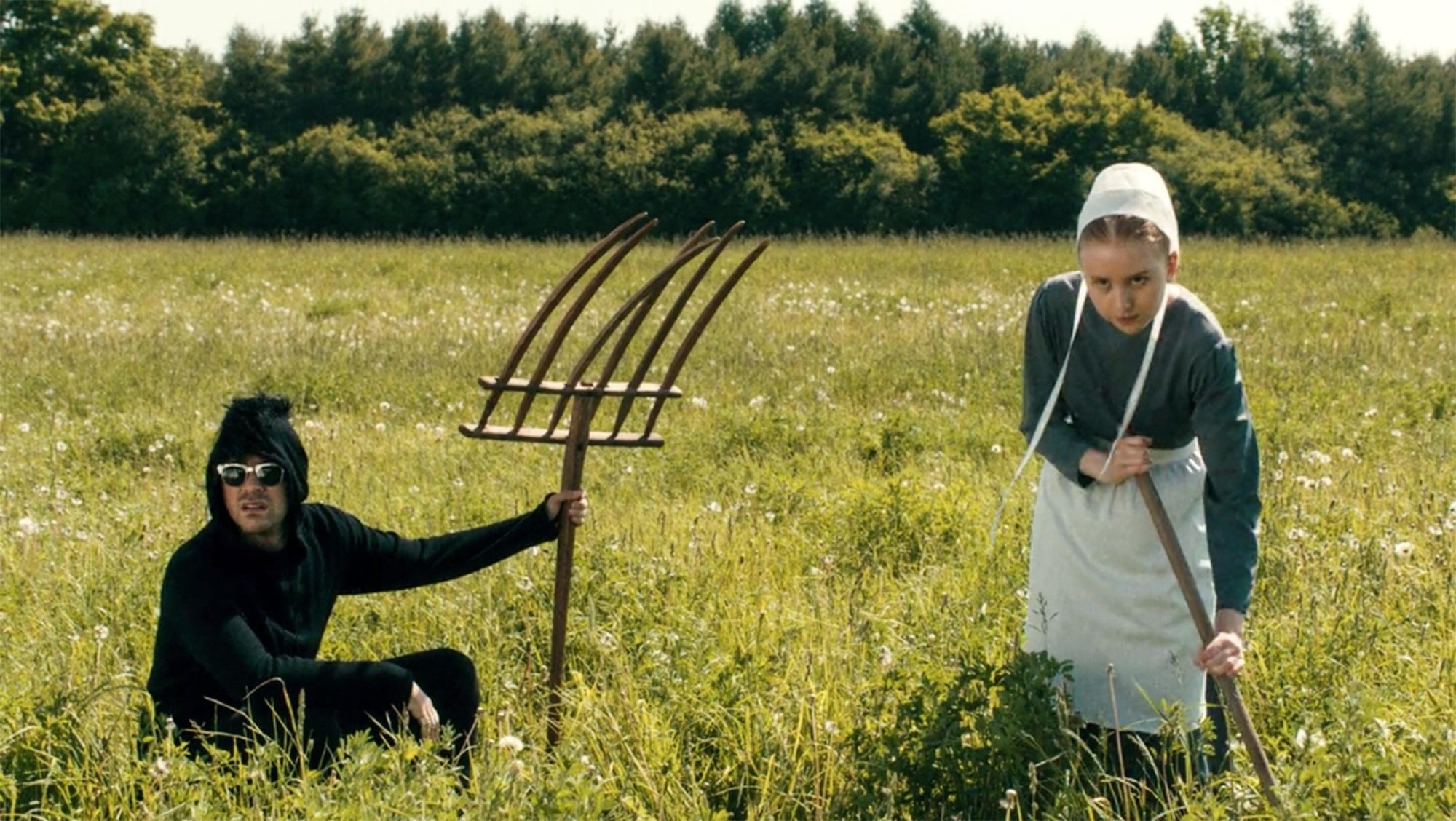 David and Amish girl in field