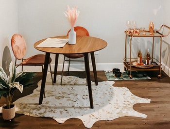 the cream rug under a reviewer's dining room table
