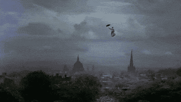 GIF of Mary Poppins flying into London