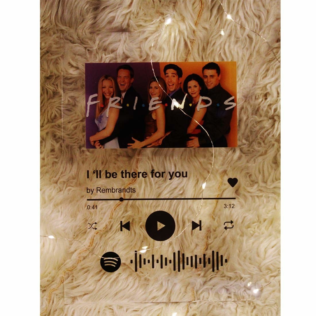 A Spotify song plaque with the Friends theme song on it 