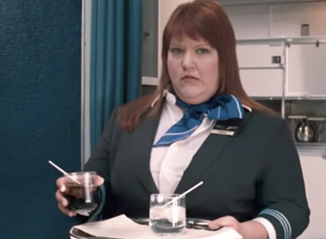 A female flight attendant looking shocked in the movie &quot;Bridesmaids&quot;