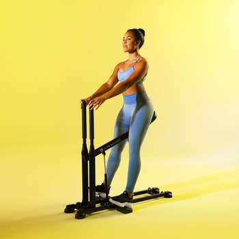 a model using the squat machine