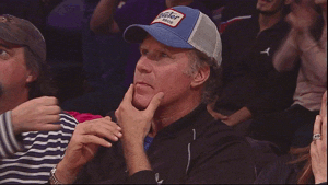 Will Ferrell strokes his chin as if deep in thought