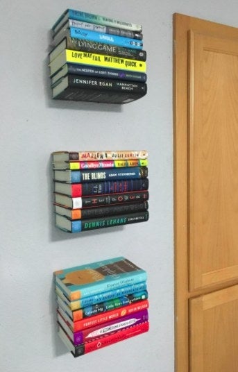 reviewer's floating bookshelves on the wall