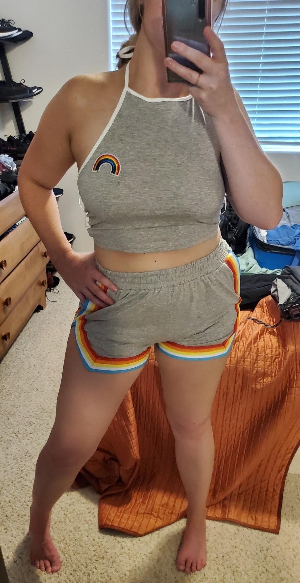 The set in gray worn by an Amazon reviewer taking a bedroom selfie