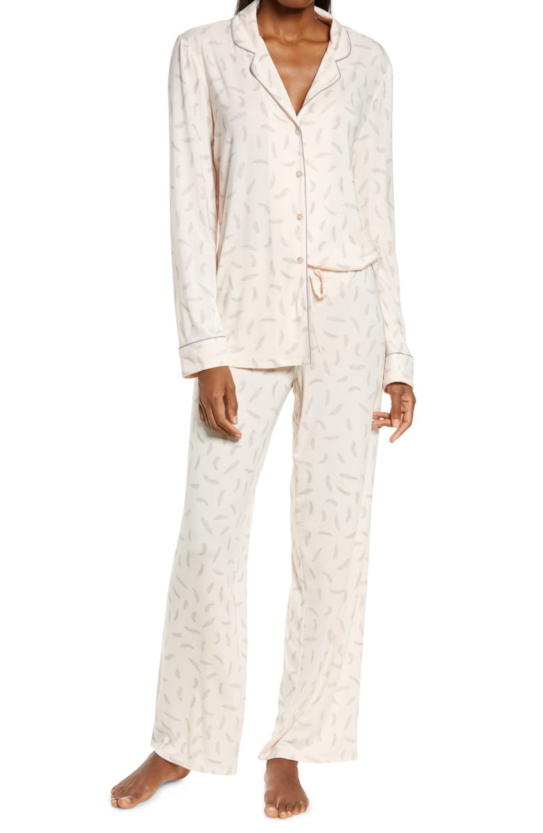 light pink pajams with feather pattern - long sleeved, collared top and pants.