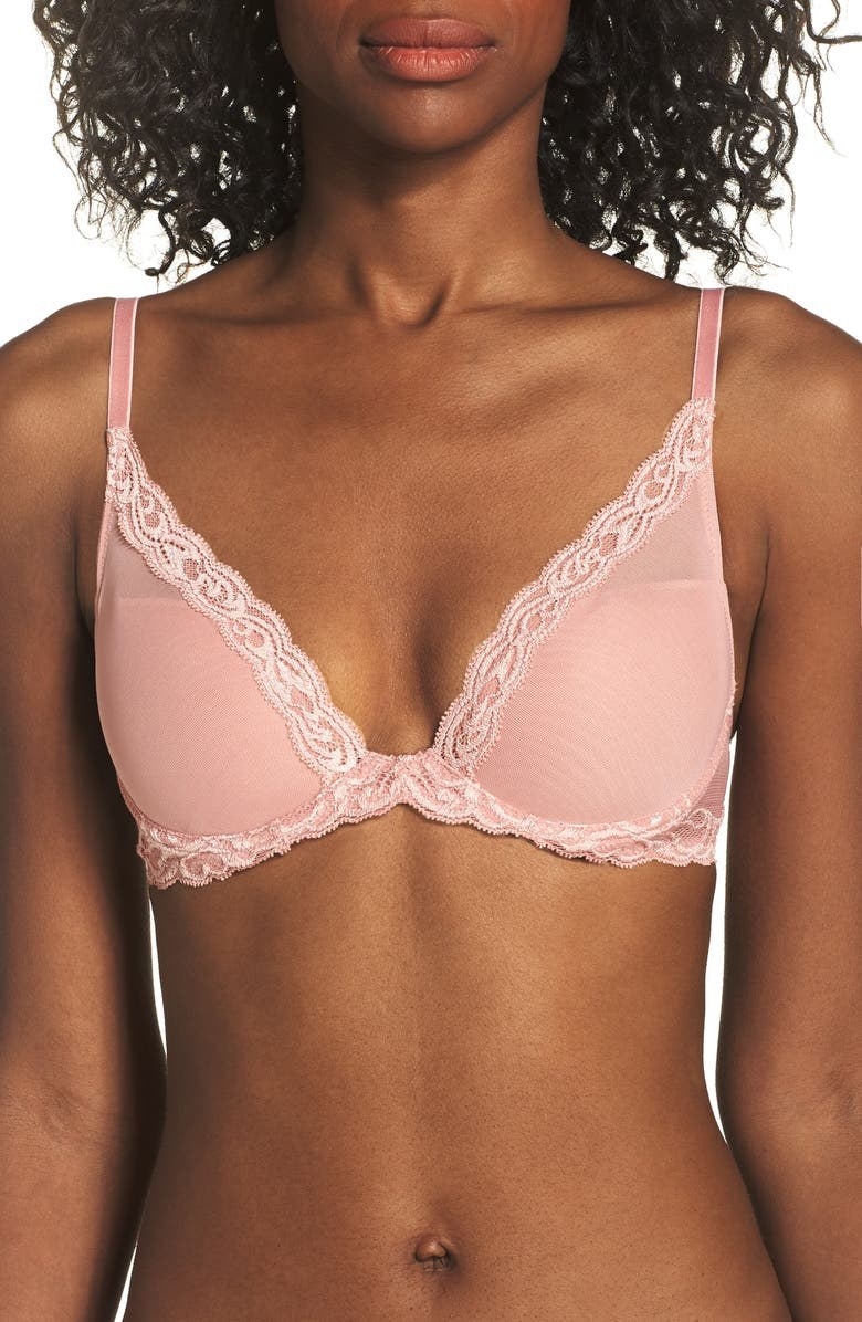 A model wearing the bra in Spanish Rose