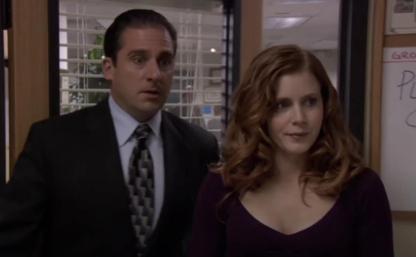 Amy next to Steve Carell as Michael