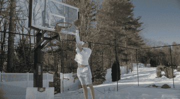 GIF of Rob Gronkowski shooting a basketball and snowball into the hoop.