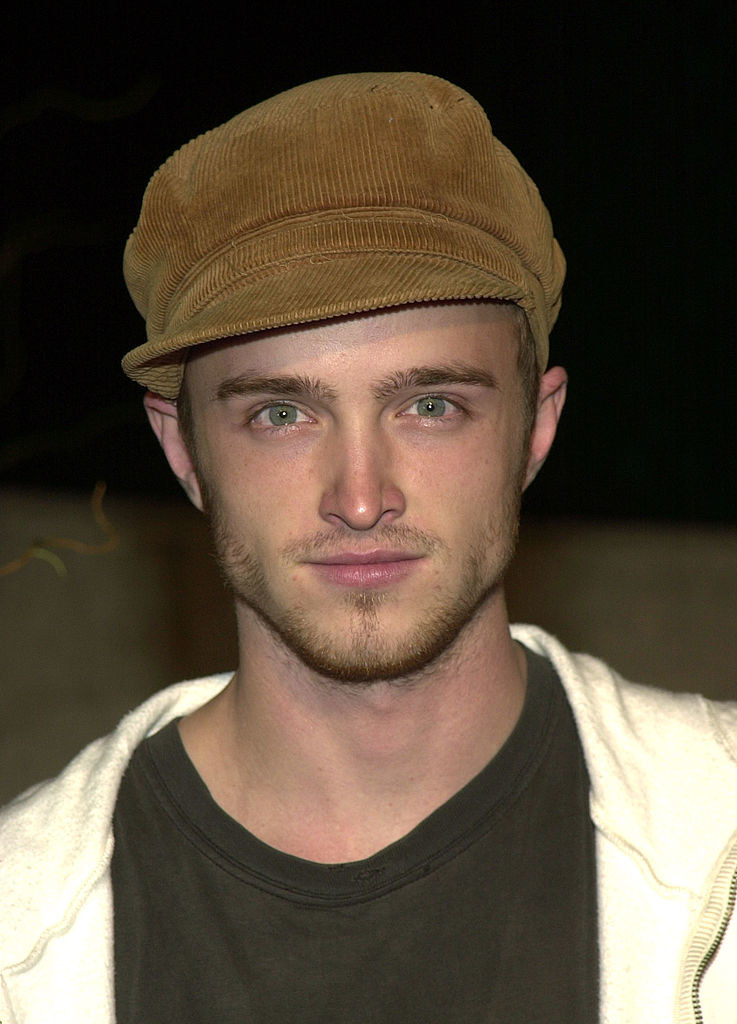 Aaron Paul in a corduroy newsboy cap