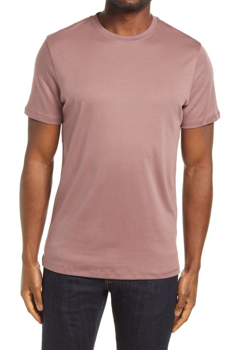A model wears the t-shirt in Dusty Pink