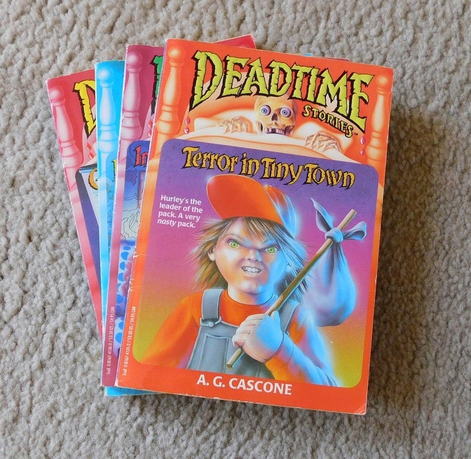 A collection of four Deadtime Stories with Terror in Tiny Town on the top of the pile