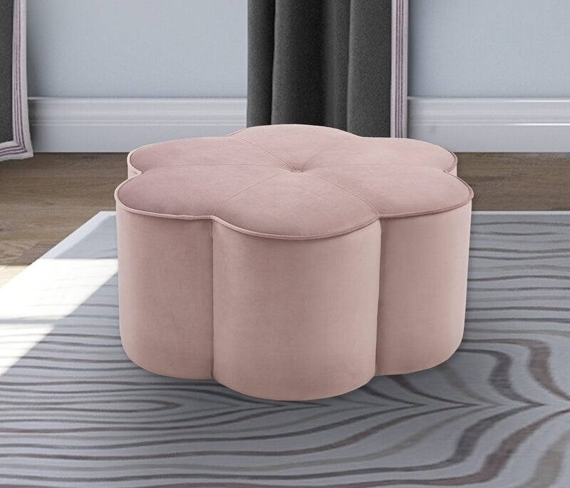 Pink tufted ottoman in flower shape