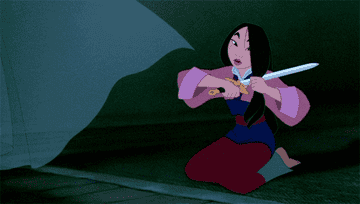 a gif of mulan using a sword to cut her hair
