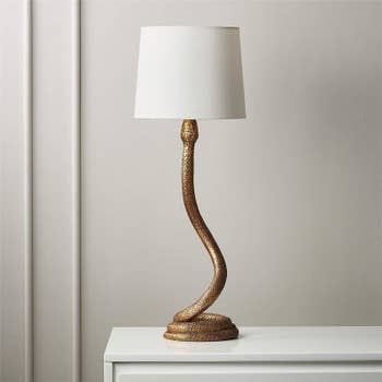 the front of the snake lamp with a white light shade
