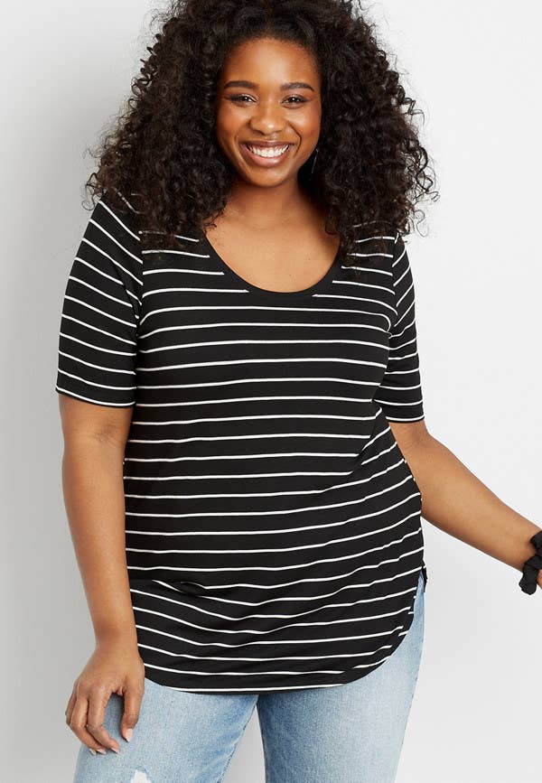 model in the black tee with white stripes