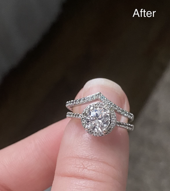 the same diamond now looking shiny and new after using the cleaning pen