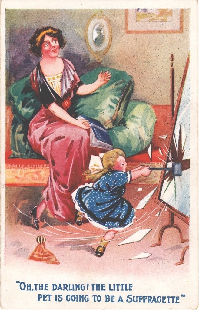 A little girl destroying a mirror in front of her mother, with, &quot;Oh, the darling, the little pet is going to be a Suffrgatte: 