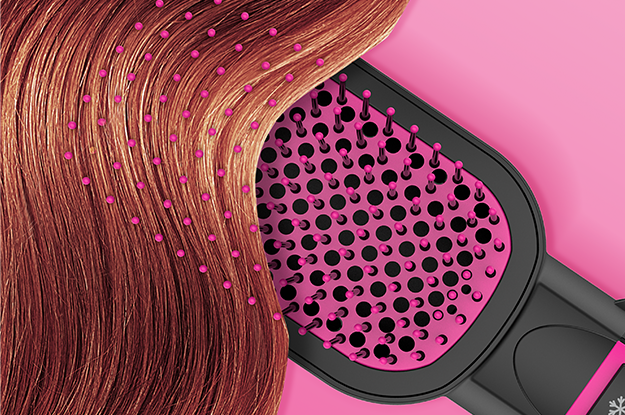 Close-up image of Knot Dr.® All-In-One Smoothing Dryer Brush being run through silky smooth hair. 