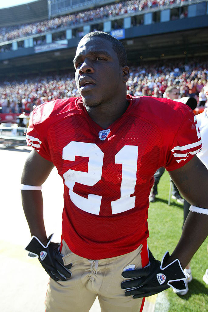Running back Frank Gore #21 of the San Francisco 49ers looks on during the NFL game against the Tampa Bay Buccaneers at Monster Park on October 30, 2005 in San Francisco, California. 