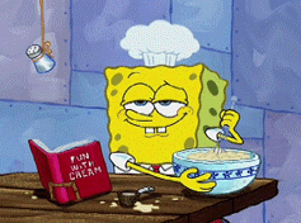 SpongeBob with a cookbook open in front of him and wearing a chef&#x27;s hat, tasting something he&#x27;s mixing in a bowl