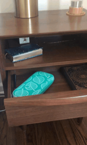 a gif of the buzzfeed editor using the soft-close drawer