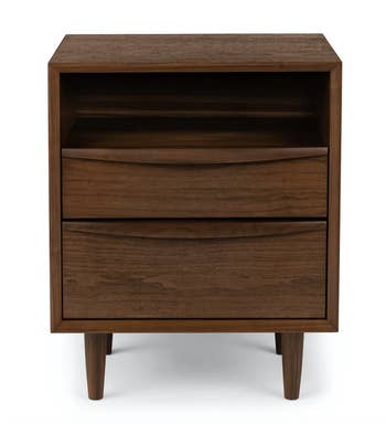 a walnut colored two-drawer end table