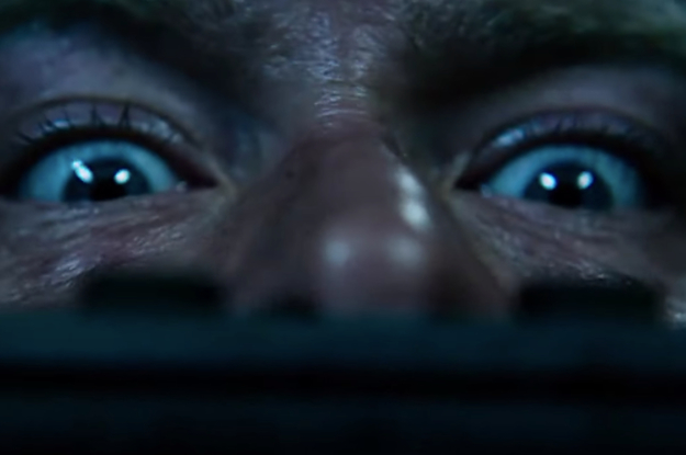 A terrified man stuck in a "Saw" trap