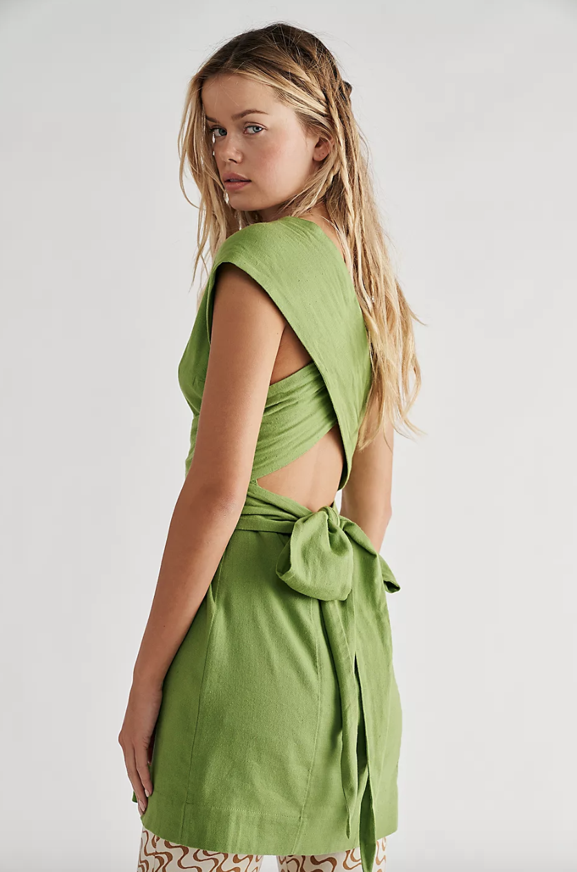 model wearing the green dress