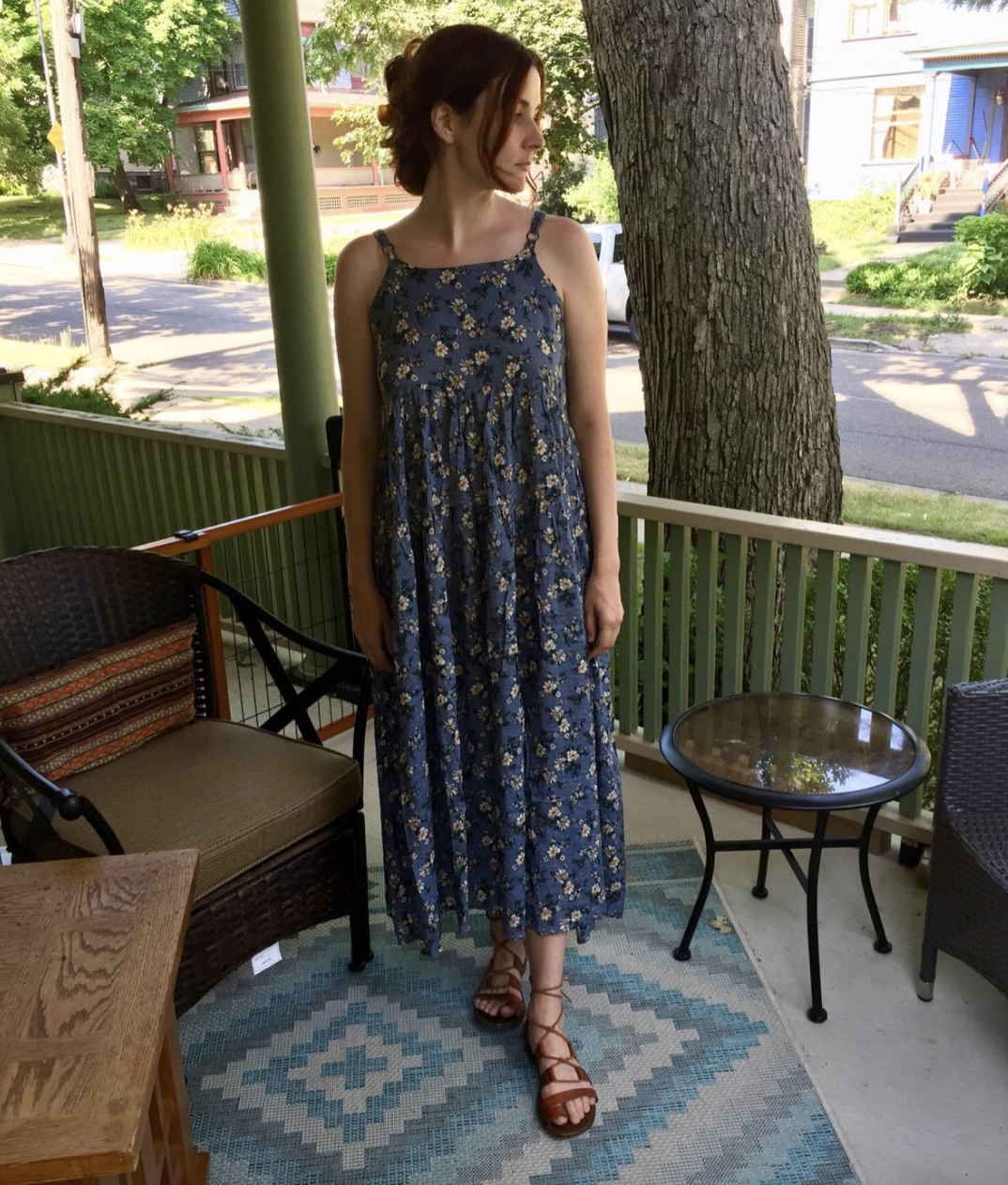 reviewer wearing the long blue dress